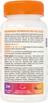 Tył białej butelki Bodymisie z pomarańczową nakrętką. Widoczne info o witaminach, '3+', 'bez cukru' i owoce.