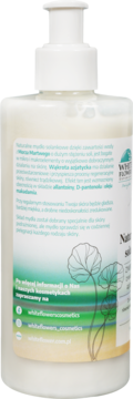 Tył białej butelki naturalnego mydła solankowego White Flower's z pompką, zielona etykieta z tekstem.