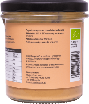 Tył słoika The Real Cashew Paste, etykieta z BIO orzechami nerkowca, składem 100% i krajem pochodzenia: Wietnam.