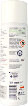 Tył opakowania pianki Seni Care 500 ml do intymnej higieny, biała butelka z etykietami i symbolami ostrzegawczymi.