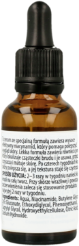 Serum z niacynamidem 10% w brązowej butelce z zakraplaczem, widok na etykietę z opisem produktu.