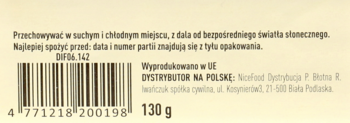 Tył opakowania płaskich chlebków pszennych z serem i czosnkiem, z kodem kreskowym i wagą 130g.