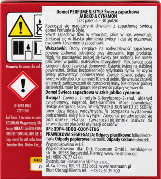 Tył czerwonego opakowania świecy Domol Jabłko i Cynamon z polskim opisem produktu i piktogramami bezpieczeństwa.