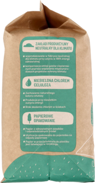 Tył opakowania Babydream Pieluszek ekologicznych. Brązowy papier, zielona etykieta: neutralne węglowo, celuloza niebielona.