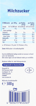 Tył opakowania Milchzucker 500g, biało-niebieskie, z tabelą wartości odżywczych, napisem "Made in Germany" i kodem kreskowym.