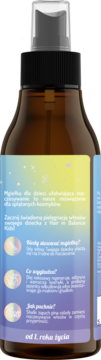 Tył brązowej butelki mgiełki do rozczesywania Hair in Balance Kids, z barwną etykietą i polskim opisem.