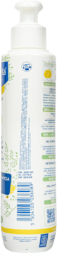 Tył białej butelki z pompką żelu Mustela z Cold Cream do skóry suchej, z zielonymi wzorami i etykietami.