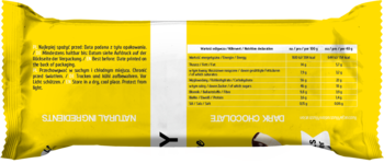 Tył żółtego opakowania batonika bananowo-arachidowego w gorzkiej czekoladzie z tabelą wartości odżywczych.