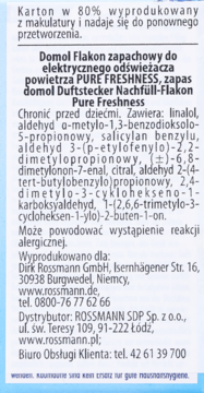 Tył opakowania zapasu Domol Pure Freshness do elektrycznego odświeżacza, biały karton z czarnym tekstem.