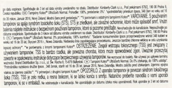 Zbliżenie polskiej etykiety ostrzegawczej dla tamponów Kimberly-Clark, z informacjami o zespole wstrząsu toksycznego TSS.