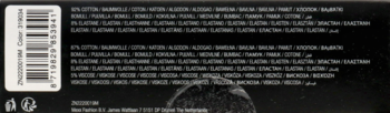 Tył czarnego opakowania produktu, widoczny biały kod kreskowy, małe symbole i szczegółowa lista składników.