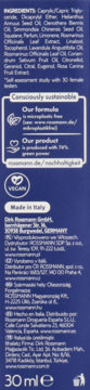 Tył ciemnoniebieskiego opakowania Isana Night&Beauty Repair 30ml, z listą składników, opisem zrównoważonego rozwoju i logo Vegan.