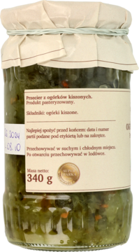 Tył słoika z pasteryzowanym przecierem z ogórków kiszonych 340g, widoczna beżowa etykieta i data.