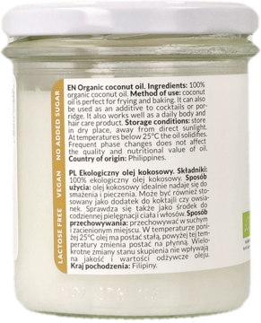 Tył szklanego słoika organicznego oleju kokosowego, widoczna etykieta z opisem składu, zastosowania i pochodzenia.