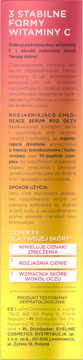 Tył opakowania Eveline Vitamin C Serum Pod Oczy, z opisem po polsku, tło gradientowe żółto-różowe.