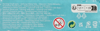 Bottom of a light blue toy box with multi-language warnings for small parts, recycling symbols, and a 0-3 age restriction.