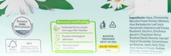 Tył opakowania nawilżanego papieru toaletowego z rumiankiem, widoczne logo FSC i certyfikaty ekologiczne.