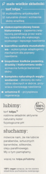 Etykieta tołpa dermokosmetyku, z listą składników i korzyści, tło niebiesko-beżowe, logo 100% vegan.