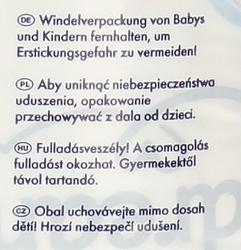 Ostrzeżenie na opakowaniu podkładów babydream: tekst o ryzyku uduszenia, w DE, PL, HU, CZ.