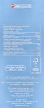 Tył jasnoniebieskiego opakowania Laudatio chai latte, z tabelą wartości odżywczych i danymi producenta.