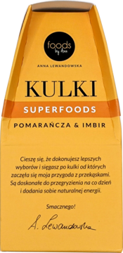 Żółto-pomarańczowe opakowanie Kulki Superfoods Pomarańcza & Imbir Foods by Anna, widok z przodu, pionowy format.