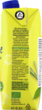 Tył żółtego kartonu napoju Bio Erfrischungsgetränk z zieloną herbatą, widoczna lista składników, logo bio.