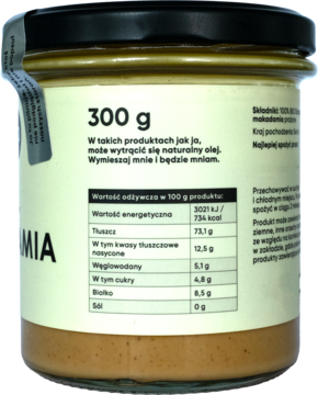 Ekogram The Real Macadamia Paste, tył szklanego słoika 300g, z widoczną tabelą wartości odżywczych.