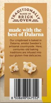 Tył opakowania bezglutenowego pieczywa chrupkiego, beżowe, z tekstem o Dalarnie, kodem kreskowym, dwoma kawałkami.