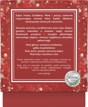 Tył opakowania świecy sojowej Cranberry Wine na czerwonym tle w płatki śniegu, z opisem nut zapachowych.