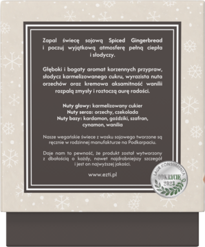 Opis świecy sojowej Spiced Gingerbread: korzenny zapach piernika i karmelu na tle ze śnieżynkami.
