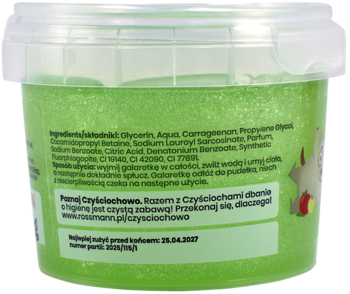 Zielony, brokatowy slime do kąpieli w przezroczystym kubku, widok tyłu z etykietą ze składem i instrukcją.