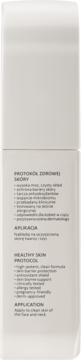 Tył białej, prostokątnej butelki serum Coda Lab, z tekstem „HEALTHY SKIN PROTOCOL” i instrukcją aplikacji.