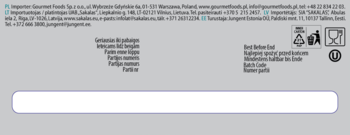 Tył opakowania czarnej herbaty cejlońskiej z mango i truskawką. Widoczne symbole recyklingu i data ważności.