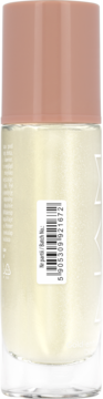 Tył zielonkawej bazy pod makijaż z efektem blur, butelka z kodem kreskowym i napisem 'Gold-enhanced'.