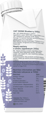 Tył biało-fioletowego opakowania Napoju Owsianego Jagodowego 250ml z widoczną tabelą wartości odżywczych.