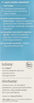 Jasnoniebieska etykieta kosmetyku z białym tekstem opisującym składniki nawilżające i logo 100% vegan.