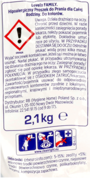Tył opakowania hipoalergicznego proszku Lovela Family 2,1kg, z ostrzeżeniami i piktogramami o podrażnieniach.
