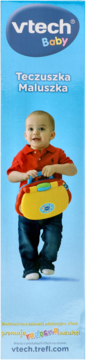 VTech Teczuszka Maluszka, żółta interaktywna zabawka edukacyjna, trzymana przez uśmiechnięte dziecko na niebieskim tle.