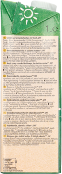 Tył zielonego kartonu Natumi napoju ryżowego waniliowego 1l, z wielojęzycznym składem. Bez cukrów.