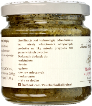 Tył słoika miodu kremowego z cytryną i miętą. Widoczna biała etykieta z polskim opisem zastosowania produktu.