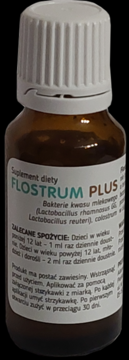 Flostrum Plus suplement diety w brązowej butelce z białą etykietą i ryflowaną zakrętką, widok z przodu.