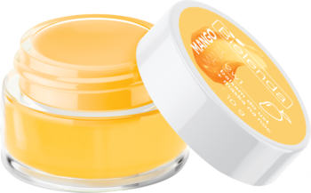 Bielenda Lip Care Sleeping Mask Mango Mania, żółty balsam w otwartym słoiczku, obok biała nakrętka z mango.