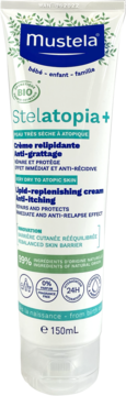 Mustela Stelatopia+ krem relipidujący 150ml w białej tubie z niebieskim logo, do skóry bardzo suchej i atopowej.