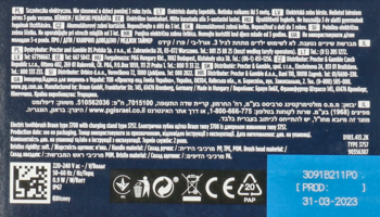 Tył ciemnoniebieskiego opakowania szczoteczki elektrycznej Oral-B Pro Kids 3+, z symbolami i datą produkcji 31-03-2023.