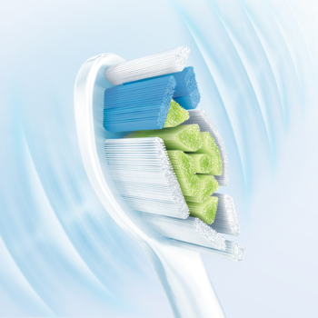 Zbliżenie na główkę szczoteczki Philips Sonicare W2 Optimal White z białymi, niebieskimi i zielonymi włóknami, z efektem wibracji.