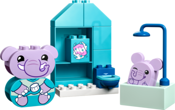 Lego Duplo Codzienne Czynności: kąpiel. Fioletowe słoniki, jeden w wannie, drugi z szczotką. Niebieska łazienka, prysznic, toaleta.