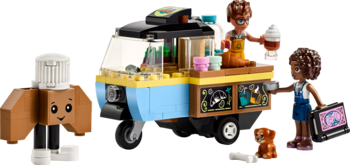 Lego Friends Mobilna Piekarnia: niebiesko-żółty food truck, mini-lalki, pies i figurka babeczki.