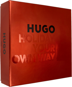 Pomarańczowo-czerwony zestaw HUGO MAN, z czarnym logo i tłoczonym napisem 'HOLIDAY YOUR OWN WAY'.