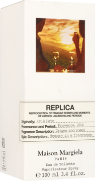 Białe opakowanie perfum Maison Margiela Replica On a Date EDT 100ml, z obrazkiem zachodu słońca i etykietą.