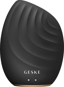 Owalna, czarna szczoteczka soniczna 5w1 Geske z falistą teksturą i srebrnym logo, widok z przodu.